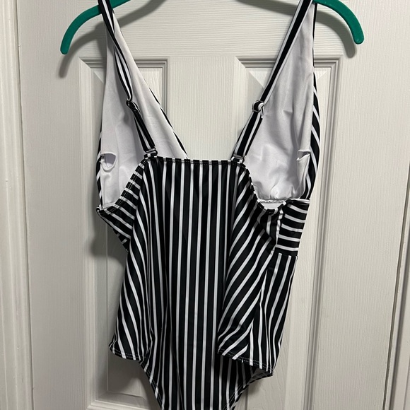 Women’s size large one piece. New without tags. - Picture 2 of 2